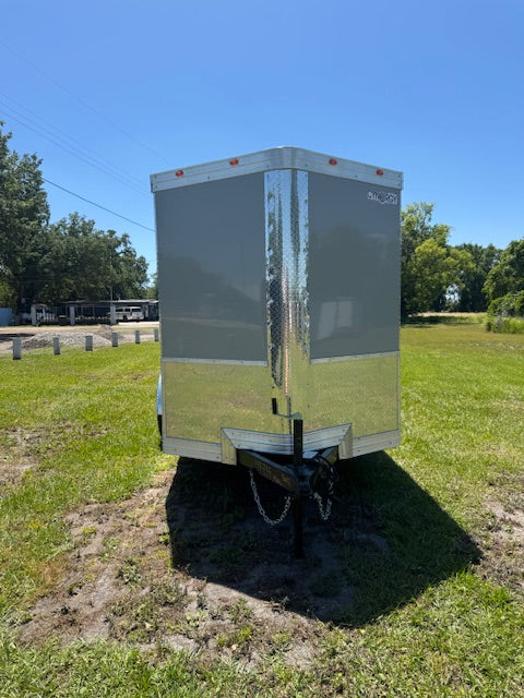 This Listing Is In Review All listings go through a standard review before they become visible to others. 2025 6X12TA ENCLOSED CARGO TRAILER RAMP DOOR 7794
