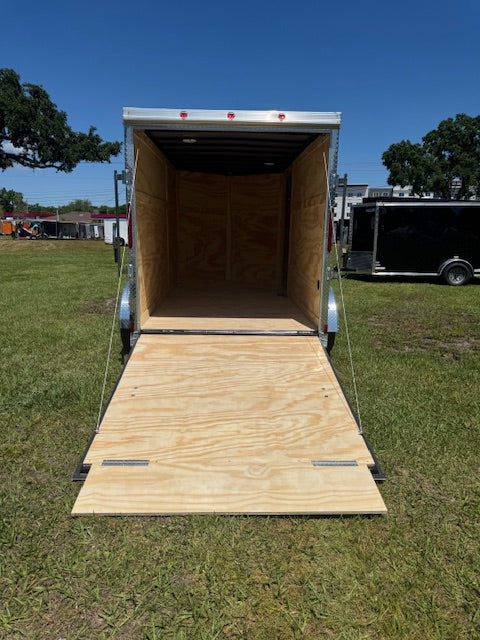 This Listing Is In Review All listings go through a standard review before they become visible to others. 2025 6X12TA ENCLOSED CARGO TRAILER RAMP DOOR 7794